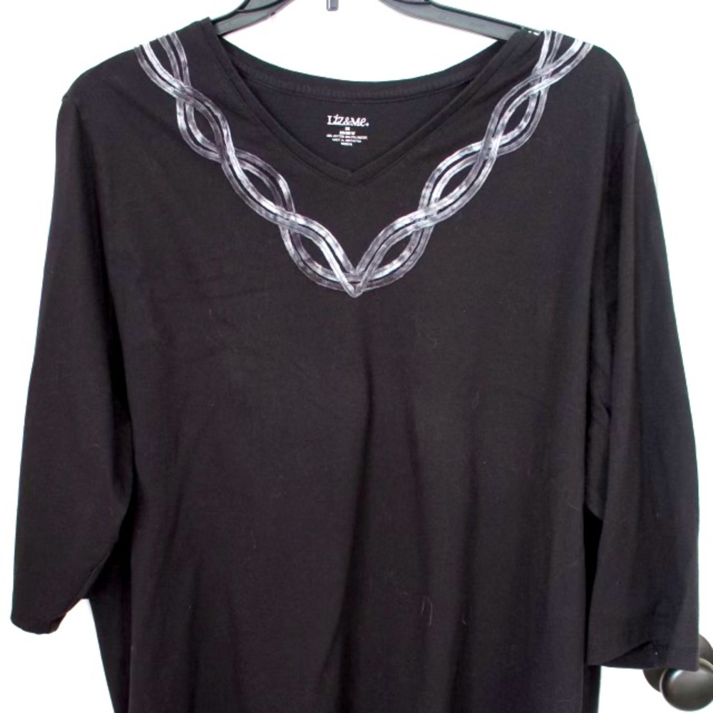 Black tunic with grayish braid at neckline, 2x